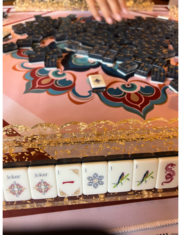 The Traditionalist mahjong set in play on a Charleston playing mat
